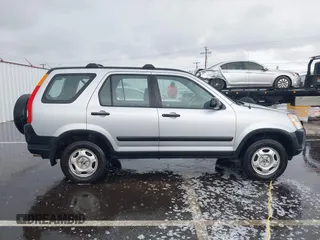 2004 Honda CR-V LX with VIN JHLRD78484C007197, listed as a IAAI auction lot 41581380 with 230,537 mi miles and . Bid and sale history available at carsss.com. Image 13.