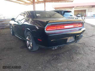 2013 Dodge Challenger SXT with VIN 2C3CDYAG1DH629087, listed as a IAAI auction lot 41993728 with 226,948 mi miles. Bid and sale history available at carsss.com. Image 3.
