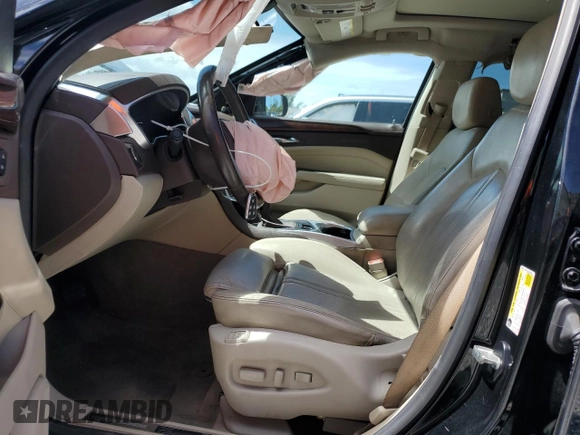 2016 Cadillac SRX Luxury Collection with VIN 3GYFNBE37GS523443, listed as a Copart auction lot 60421285 with 71,148 mi miles and Salvage title. Bid and sale history available at DreamBid. Image 7.