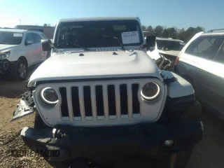 2018 Jeep Wrangler Unlimited Sahara z VIN 1C4HJXEG0JW207873, wystawiony jako IAAI lot #41213655 z przebiegiem 61 043 mil mil oraz . Historia ofert i sprzedaży dostępna na DreamBid. Obrazek 12.