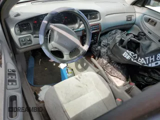 1999 Nissan Altima XE z VIN 1N4DL01D9XC148205, wystawiony jako Copart lot #50392305 z przebiegiem 90 698 mil mil oraz Szkoda całkowita • Salvage title. Historia ofert i sprzedaży dostępna na DreamBid. Obrazek 8.