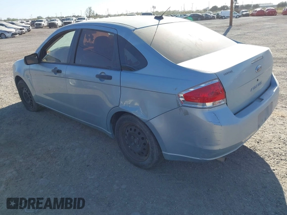 2009 Ford Focus S with VIN 1FAHP34N39W211005, listed as a IAAI auction lot 40666052 with 1 mi miles. Bid and sale history available at carsss.com. Image 3.