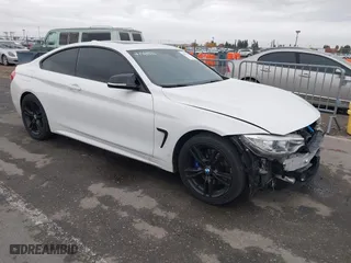2014 BMW 4 Series 428i xDrive with VIN WBA3N5C56EK196702, listed as a IAAI auction lot 40934482 with 120,292 mi miles. Bid and sale history available at carsss.com. Image 1.