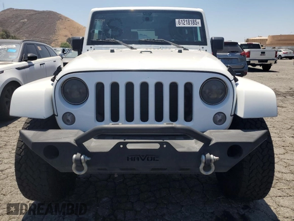 2015 Jeep Wrangler Rubicon Hard Rock z VIN 1C4BJWCG5FL561397, wystawiony jako Copart lot #61218185 z przebiegiem 164 240 mil mil oraz Czysty tytuł • Clean title. Historia ofert i sprzedaży dostępna na DreamBid. Obrazek 5.