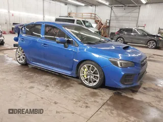 2019 Subaru WRX STI with VIN JF1VA2R69K9801164, listed as a IAAI auction lot 41371724 with 127,305 mi miles and . Bid and sale history available at DreamBid. Image 1.