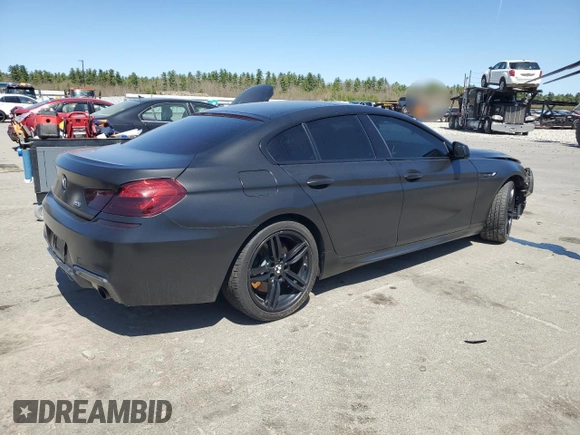 2015 BMW 6 Series 640i xDrive z VIN WBA6B8C53FD453909, wystawiony jako Copart lot #55292765 z przebiegiem 84 971 mil mil oraz Szkoda całkowita • Salvage title. Historia ofert i sprzedaży dostępna na DreamBid. Obrazek 3.