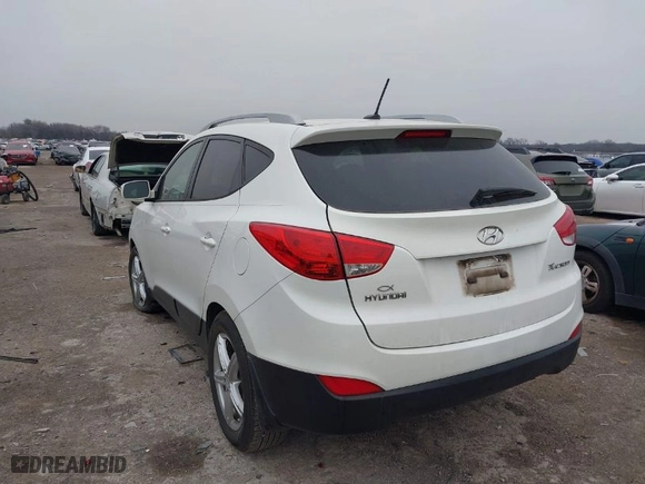 2013 Hyundai Tucson GLS with VIN KM8JU3AC2DU561443, listed as a IAAI auction lot 41600727 with 179,694 mi miles. Bid and sale history available at carsss.com. Image 3.