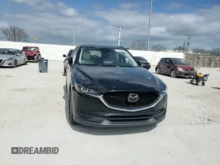 2021 Mazda CX-5 Touring z VIN JM3KFBCM8M1436782, wystawiony jako Copart lot #54144645 z przebiegiem 52 388 mil mil oraz Szkoda całkowita • Salvage title. Historia ofert i sprzedaży dostępna na DreamBid. Obrazek 14.