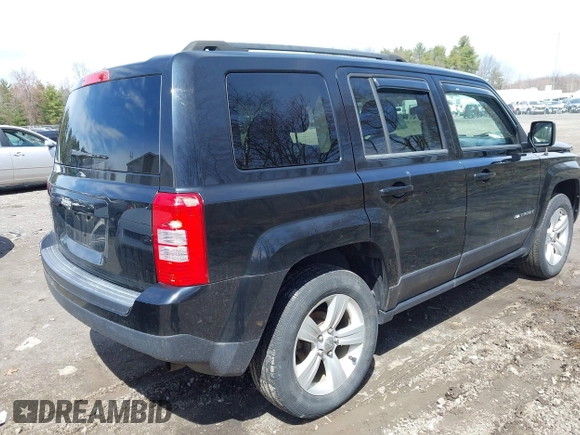 2014 Jeep Patriot Sport with VIN 1C4NJRBB1ED811019, listed as a IAAI auction lot 42181813 with 124,837 mi miles and . Bid and sale history available at DreamBid. Image 4.