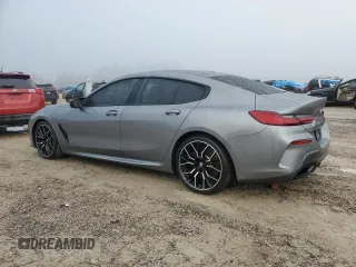 2023 BMW 8 Series M850i z VIN WBAGV8C02PCL20503, wystawiony jako Copart lot #84214214 z przebiegiem Nie podano mil oraz Szkoda całkowita • Salvage title. Historia ofert i sprzedaży dostępna na DreamBid. Obrazek 2.