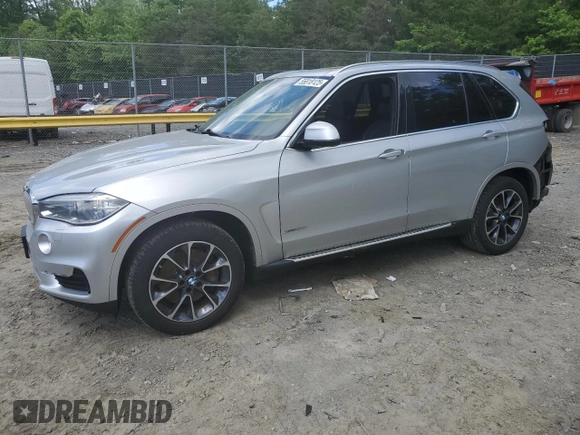 2017 BMW X5 xDrive50i with VIN 5UXKR6C53H0J84790, listed as a Copart auction lot 55818125 with 158,087 mi miles and Salvage title. Bid and sale history available at DreamBid. Image 1.