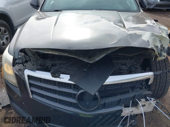 2013 Cadillac ATS with VIN 1G6AA5RX4D0141578, listed as a IAAI auction lot 41406633 with 147,483 mi miles and . Bid and sale history available at DreamBid. Image 6.
