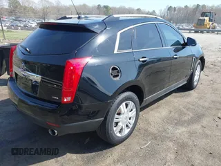 2016 Cadillac SRX Luxury Collection with VIN 3GYFNEE38GS533898, listed as a IAAI auction lot 41898772 with 187,101 mi miles. Bid and sale history available at carsss.com. Image 4.