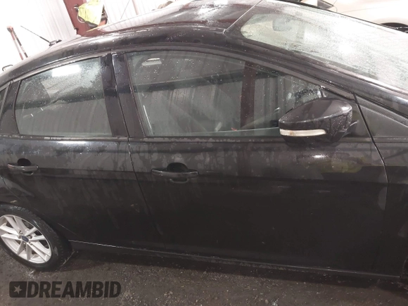 2015 Ford Focus SE with VIN 1FADP3F25FL216205, listed as a IAAI auction lot 42425478 with 124,117 mi miles and . Bid and sale history available at DreamBid. Image 13.