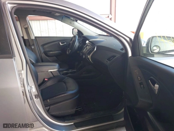 2013 Hyundai Tucson GLS with VIN KM8JU3AC6DU769194, listed as a IAAI auction lot 42018641 with 169,537 mi miles. Bid and sale history available at carsss.com. Image 5.