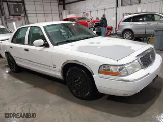 2005 Mercury Grand Marquis GS with VIN 2MEFM74W55X603264, listed as a IAAI auction lot 41605084 with 189,209 mi miles. Bid and sale history available at carsss.com. Image 1.