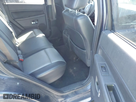 2009 Jeep Grand Cherokee Laredo with VIN 1J8HR48P19C540785, listed as a IAAI auction lot 41729851 with 205,504 mi miles. Bid and sale history available at carsss.com. Image 8.