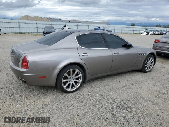 2005 Maserati Quattroporte z VIN ZAMCE39A050017377, wystawiony jako Copart lot #50191415 z przebiegiem 39 545 mil mil oraz Czysty tytuł • Clean title. Historia ofert i sprzedaży dostępna na DreamBid. Obrazek 3.