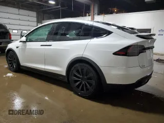 2023 Tesla Model X with VIN 7SAXCDE5XPF381338, listed as a Copart auction lot 51638855 with 1,570 mi miles and Clean Title. Bid and sale history available at carsss.com. Image 2.