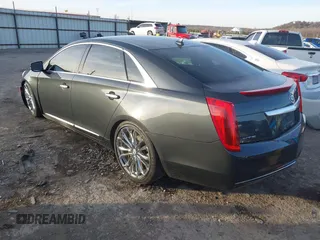 2013 Cadillac XTS with VIN 2G61N5S34D9231315, listed as a IAAI auction lot 41092660 with 206,093 mi miles. Bid and sale history available at carsss.com. Image 3.