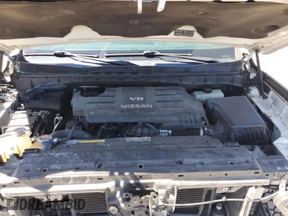 2017 Nissan Titan SV z VIN 1N6AA1EJ0HN569810, wystawiony jako Copart lot #48726215 z przebiegiem 126 458 mil mil oraz Szkoda całkowita • Salvage title. Historia ofert i sprzedaży dostępna na DreamBid. Obrazek 11.