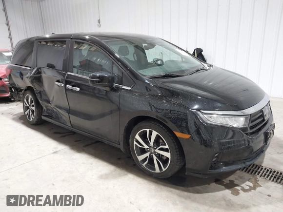2023 Honda Odyssey Touring z VIN 5FNRL6H85PB039450, wystawiony jako IAAI lot #41504351 z przebiegiem 51 000 mil mil oraz . Historia ofert i sprzedaży dostępna na DreamBid. Obrazek 1.