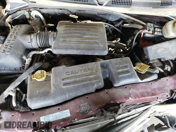 2001 Dodge Dakota Sport z VIN 1B7GG22NX1S172265, wystawiony jako Copart lot #42190165 z przebiegiem 109 799 mil mil oraz Szkoda całkowita • Salvage title. Historia ofert i sprzedaży dostępna na DreamBid. Obrazek 13.