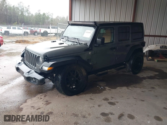 2020 Jeep Wrangler Unlimited Sport S z VIN 1C4HJXDG1LW103364, wystawiony jako IAAI lot #41541954 z przebiegiem 57 735 mil mil oraz . Historia ofert i sprzedaży dostępna na DreamBid. Obrazek 2.