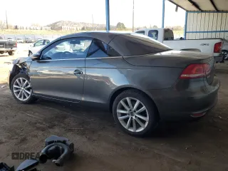2014 Volkswagen Eos Komfort with VIN WVWBW8AH9EV006190, listed as a Copart auction lot 52390705 with 124,370 mi miles and Salvage Title. Bid and sale history available at DreamBid. Image 2.