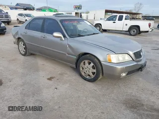 2002 Acura RL z VIN JH4KA96552C008589, wystawiony jako IAAI lot #41860930 z przebiegiem 210 847 mil mil oraz . Historia ofert i sprzedaży dostępna na DreamBid. Obrazek 1.
