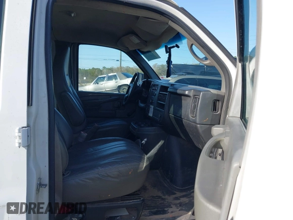 2013 Chevrolet Express Cargo with VIN 1GCWGFBA7D1110560, listed as a IAAI auction lot 41730234 with 185,291 mi miles and . Bid and sale history available at DreamBid. Image 5.