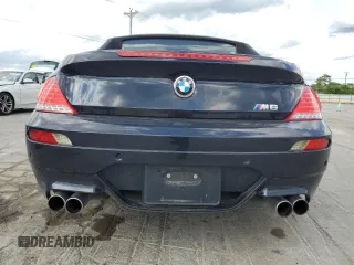 2009 BMW 6 Series M6 z VIN WBSEK93599CY80065, wystawiony jako Copart lot #55277505 z przebiegiem 125 557 mil mil oraz Tytuł czysty. Historia ofert i sprzedaży dostępna na DreamBid. Obrazek 6.