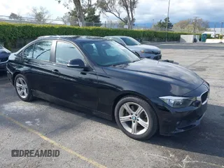 2013 BMW 3 Series 328i with VIN WBA3C1C55DF437722, listed as a IAAI auction lot 41888700 with 70,786 mi miles. Bid and sale history available at carsss.com. Image 1.