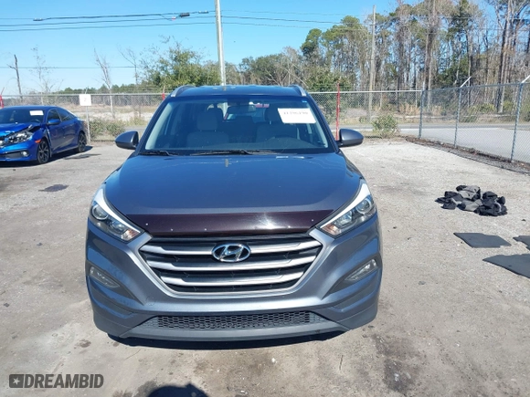 2017 Hyundai Tucson SE Plus with VIN KM8J33A45HU420349, listed as a IAAI auction lot 41296190 with 77,910 mi miles. Bid and sale history available at carsss.com. Image 12.