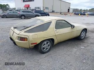 1982 Porsche 928 z VIN WP0JA0921CS820795, wystawiony jako IAAI lot #41741787 z przebiegiem 121 568 mil mil oraz . Historia ofert i sprzedaży dostępna na DreamBid. Obrazek 4.