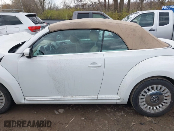 2015 Volkswagen Beetle 1.8T w/Tech with VIN 3VW517AT3FM805868, listed as a IAAI auction lot 40886820 with 113,380 mi miles and . Bid and sale history available at DreamBid. Image 14.