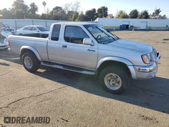 2000 Nissan Frontier XE with VIN 1N6ED26T1YC327635, listed as a Copart auction lot 43149525 with 922,578 mi miles and Salvage title. Bid and sale history available at DreamBid. Image 4.