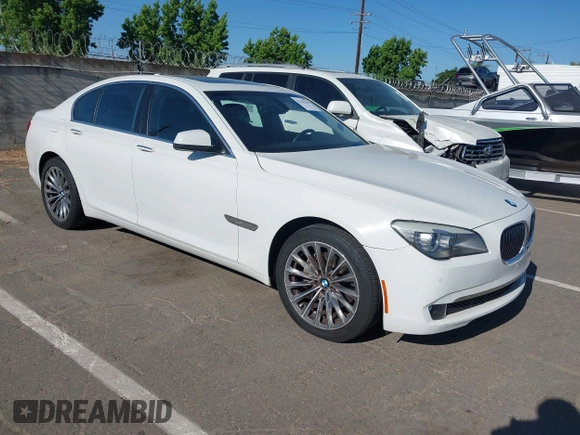 2012 BMW 7 Series 740i with VIN WBAKA4C51CDS99206, listed as a IAAI auction lot 42555719 with 104,303 mi miles and . Bid and sale history available at DreamBid. Image 1.
