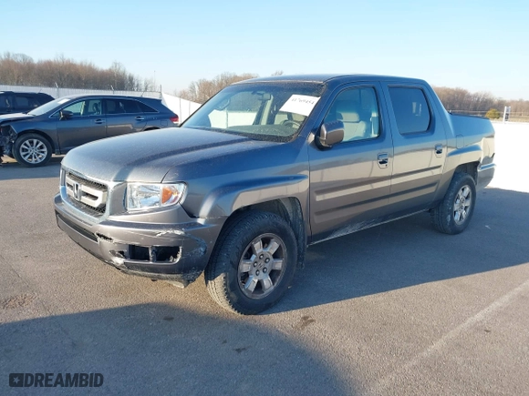 2010 Honda Ridgeline RTS with VIN 5FPYK1F49AB013790, listed as a IAAI auction lot 41769454 with 139,682 mi miles. Bid and sale history available at carsss.com. Image 2.