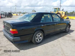 1987 Mercedes-Benz 300 with VIN WDBEA30D8HA397811, listed as a IAAI auction lot 41868336 with 124,720 mi miles. Bid and sale history available at carsss.com. Image 4.