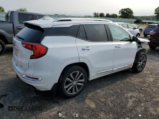 2018 GMC Terrain Denali z VIN 3GKALXEX6JL282177, wystawiony jako Copart lot #60622865 z przebiegiem 78 034 mil mil oraz Czysty tytuł • Clean title. Historia ofert i sprzedaży dostępna na DreamBid. Obrazek 3.