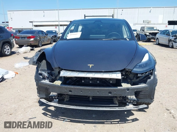 2024 Tesla Model Y with VIN 7SAYGDED2RF040745, listed as a IAAI auction lot 41986613 with 9,778 mi miles and . Bid and sale history available at DreamBid. Image 12.