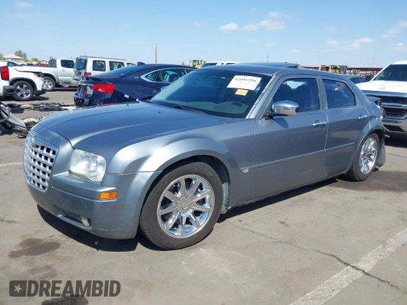2006 Chrysler 300 C with VIN 2C3KA63H56H313967, listed as a IAAI auction lot 42056998 with 143,592 mi miles and . Bid and sale history available at carsss.com. Image 17.