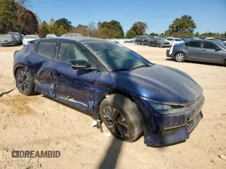 2024 Kia EV6 GT-Line with VIN KNDC44LA6R5206551, listed as a Copart auction lot 77803034 with 5,074 mi miles and Salvage Title. Bid and sale history available at carsss.com. Image 4.