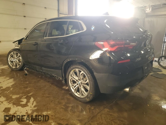 2022 BMW X2 xDrive28i with VIN WBXYJ1C07N5U38996, listed as a Copart auction lot 42139835 with 55,413 mi miles and Salvage Title. Bid and sale history available at carsss.com. Image 2.