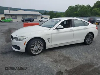 2015 BMW 4 Series 428i xDrive with VIN WBA4C9C52FD330306, listed as a Copart auction lot 60834435 with 167,034 mi miles and Salvage title. Bid and sale history available at DreamBid. Image 1.