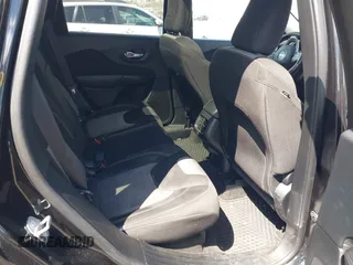 2014 Jeep Cherokee Latitude with VIN 1C4PJMCS8EW257959, listed as a IAAI auction lot 41987529 with 124,749 mi miles. Bid and sale history available at carsss.com. Image 8.