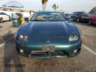 1997 Mitsubishi 3000GT GT z VIN JA3AM84J1VY004382, wystawiony jako Copart lot #45949465 z przebiegiem 166 552 mil mil oraz Czysty tytuł • Clean title. Historia ofert i sprzedaży dostępna na DreamBid. Obrazek 5.