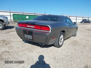 2011 Dodge Challenger z VIN 2B3CJ4DG3BH512974, wystawiony jako IAAI lot #41431931 z przebiegiem 186 845 mil mil oraz . Historia ofert i sprzedaży dostępna na DreamBid. Obrazek 4.