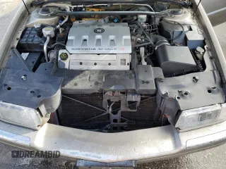 2000 Cadillac Eldorado z VIN 1G6EL12Y7YB703863, wystawiony jako Copart lot #85433244 z przebiegiem 175 416 mil mil oraz Szkoda całkowita • Salvage title. Historia ofert i sprzedaży dostępna na DreamBid. Obrazek 11.